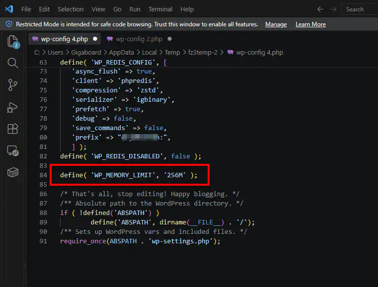 Adding the WP_MEMORY_LIMIT constant to the wp-config.php file in a code editor to increase PHP memory to 256M and resolve connection timeouts